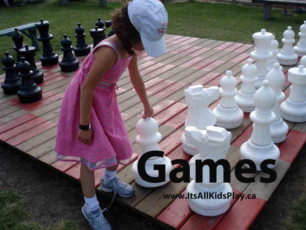 Fun games for kids - picture of girl playing giant chess