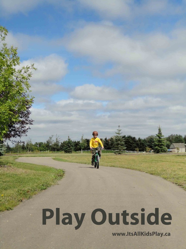 Outside play for kids--boy on bike