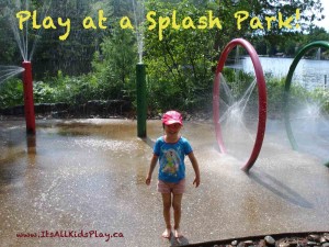 Children playing at a splash park in her clothes.